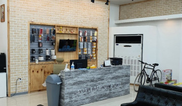 아이보리톤으로 완성한 순천 휴대폰 매장 인테리어: 모던함과 따뜻함의 조화